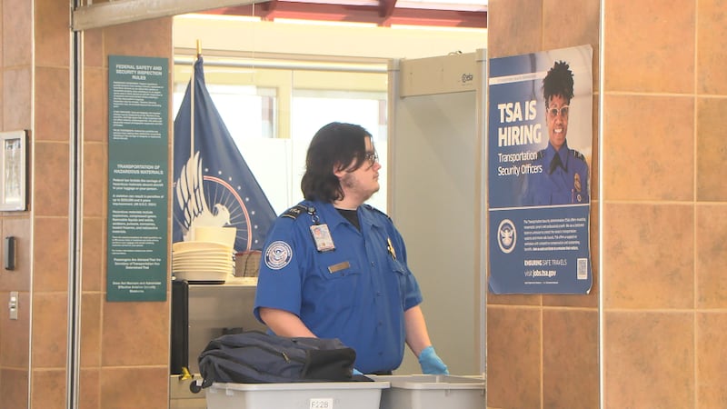 TSA agent working at the Central Illinois Regional Airport.