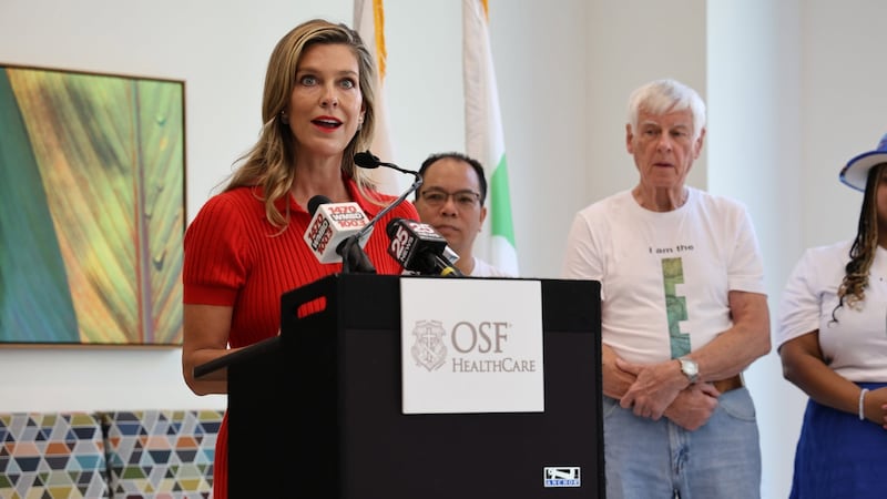 Laura Cullinan, President of the Gilmore Foundation, at a news conference to dedicate a mural...