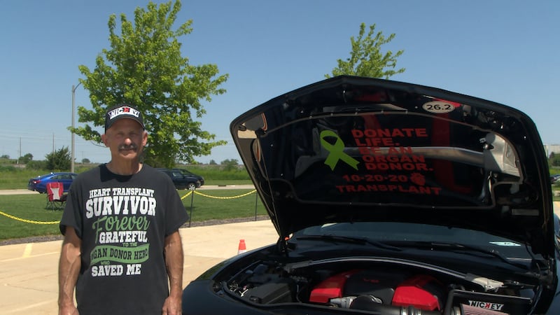 John Rodino stands in front of his car at the “Hop on the Road: A Celebration of Route 66” event.