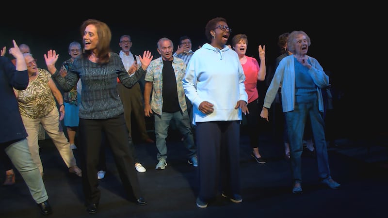 Members of the "Young at Heartland" theatre troupe rehearse a dance number Monday.